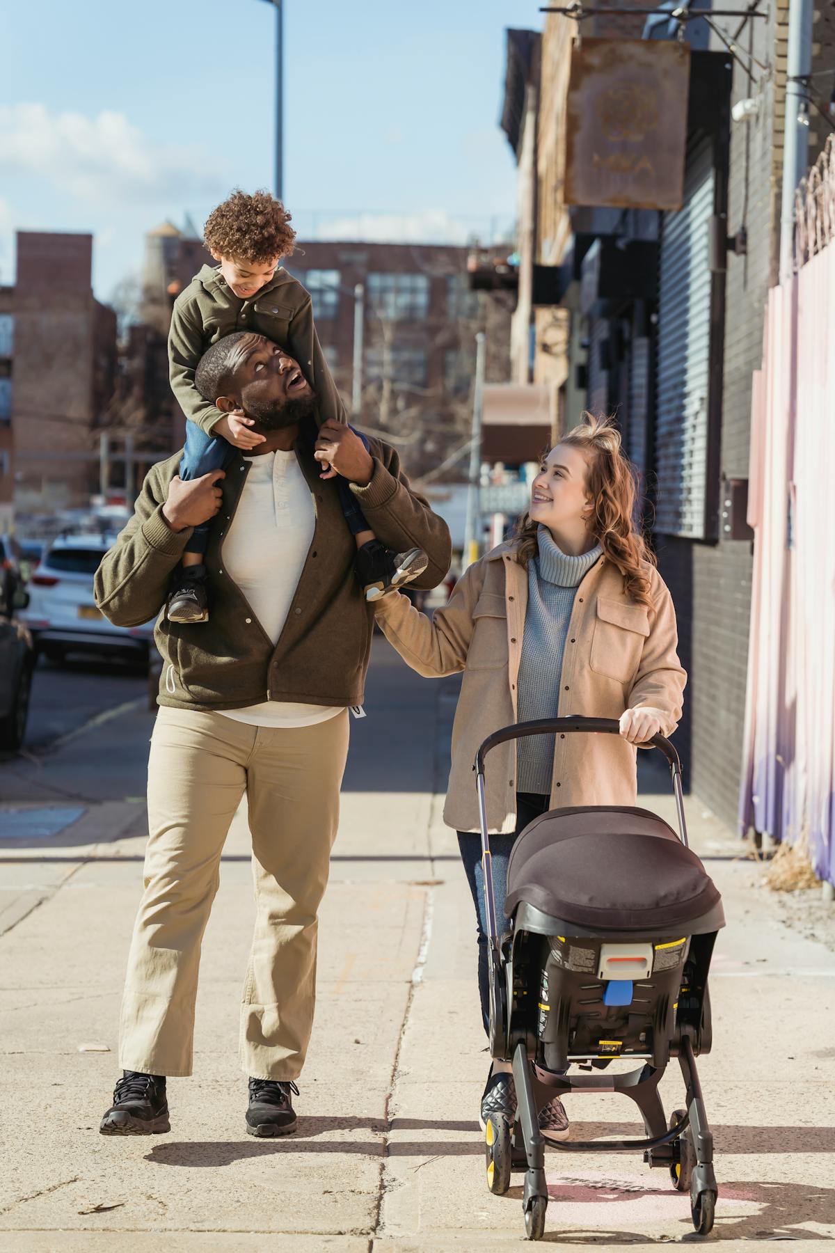 Family with stroller in the city
